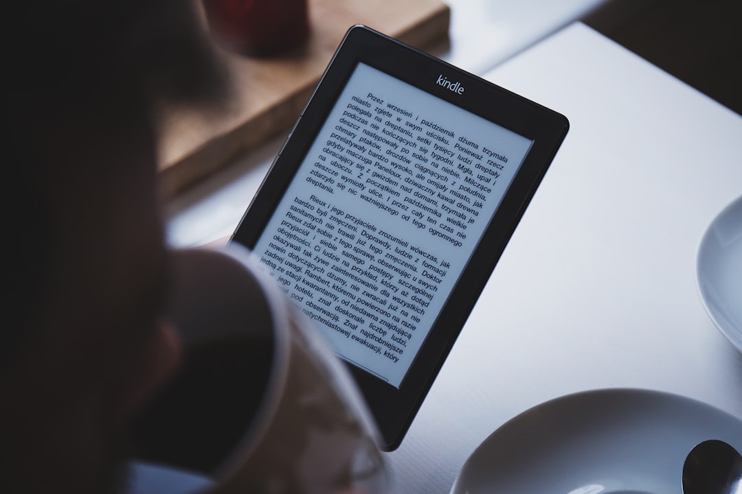 turned on black Amazon Kindle e-book reader turned on black Amazon Kindle e-book reader